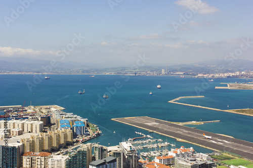 Aerial view of the port, city and Bay of Gibraltar located at the southern end of the Iberian Peninsula. Taken from the Great Siege Tunnels at the top of the Rock.