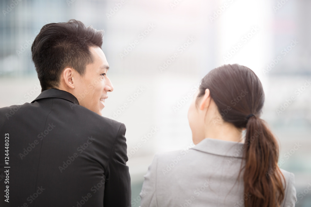 businesspeople sit back to you businesspeople sit back to you