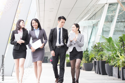 Photography businesspeople talk in office