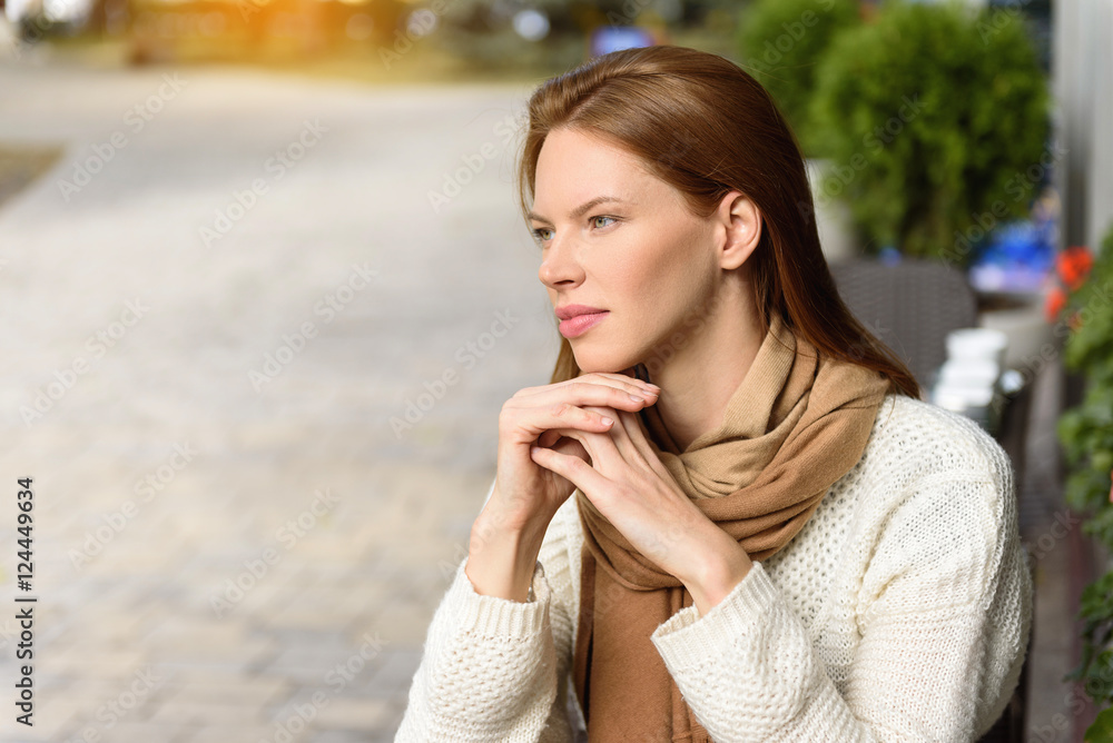 Thoughtful girl resting in cafeteria Thoughtful girl resting in cafeteria