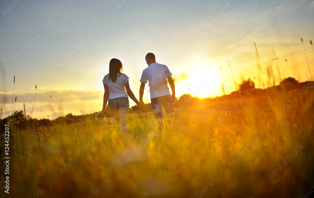 guy with the girl at sunset