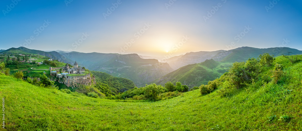 Obraz premium Ancient monastery in setting sun. Tatev. Armenia
