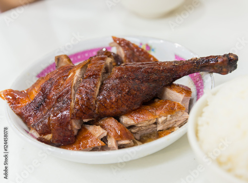 Roast duck, Chinese style on the white dish closeup