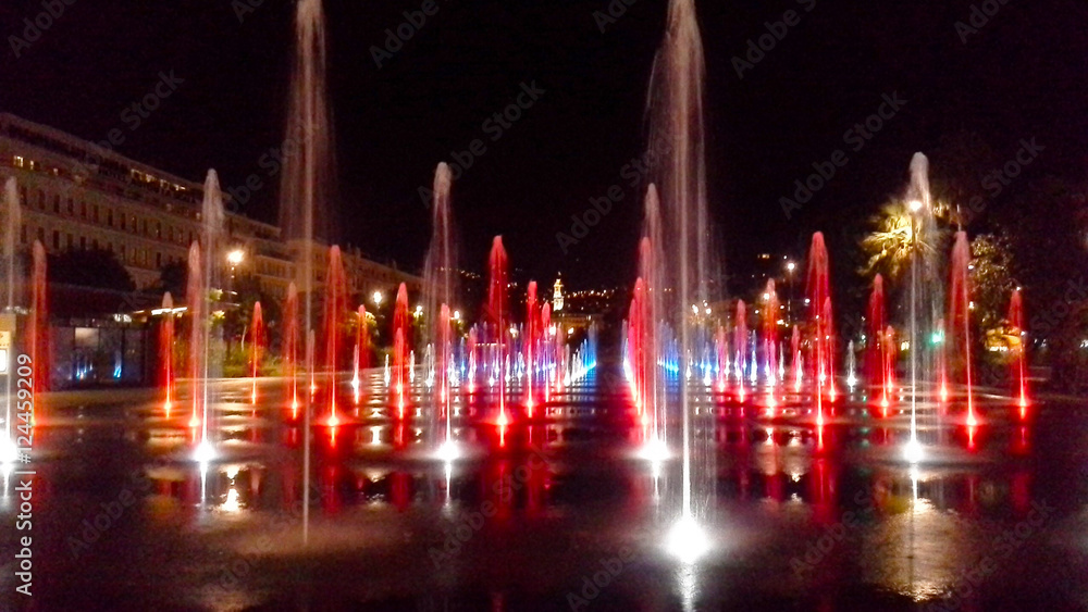 The Fontaine du Soleil on Place Massena in the nights, Nice, French Riviera, France.