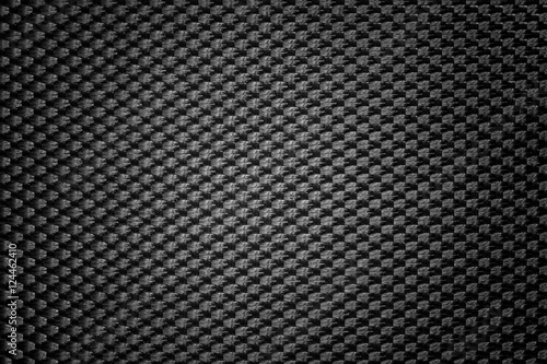 Black symmetrical synthetic fiber texture with vignette.