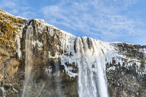 Frozen waterfall Seljalandsfoss. Iceland.