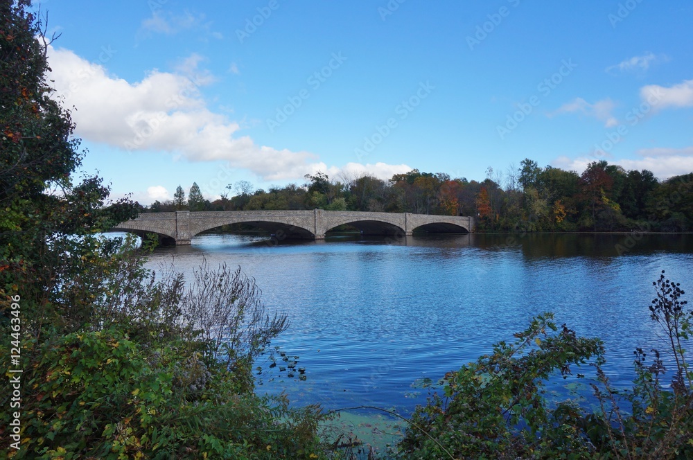 Fall foliage over the Washington Bridge on Lake Carnegie in Princeton, New Jersey