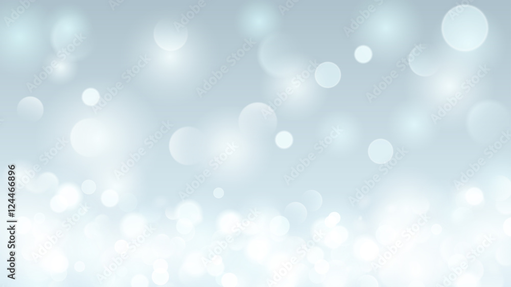 Abstract background with bokeh effect in light blue