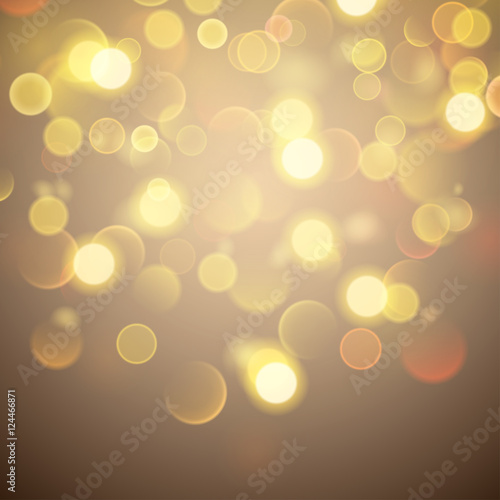 Abstract background with bokeh effect in gold