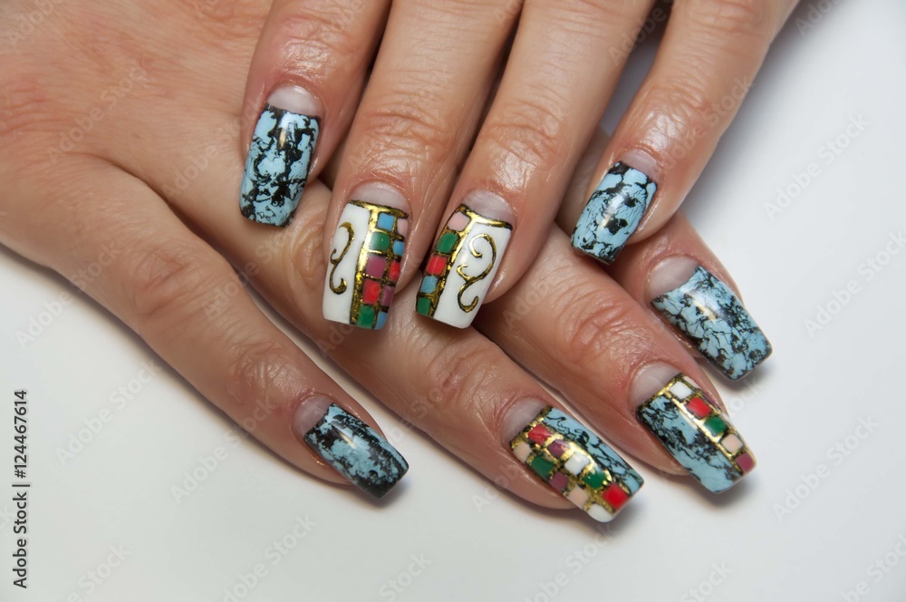 black, blue, white, green manicure with cracks on the long square nails black, blue, white, green manicure with cracks on the long square nails