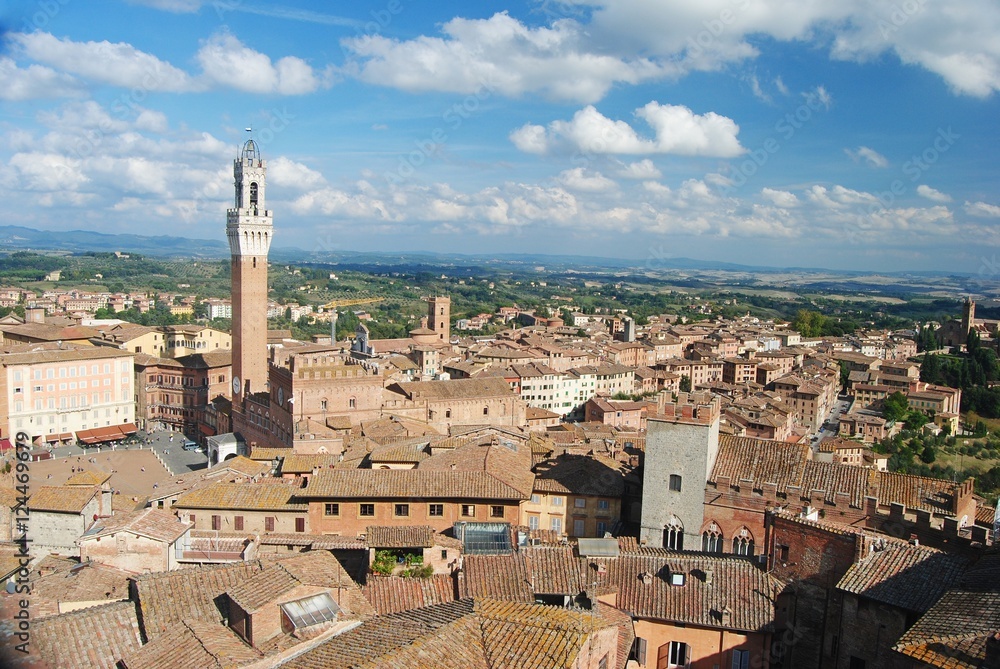 View over Siena, Italy with Palazzo Comunale on the left.