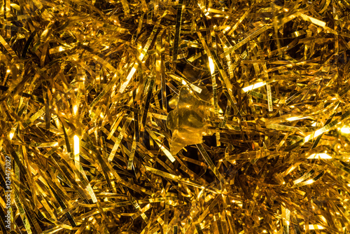 Christmas background with gold tinsel. Holiday design
