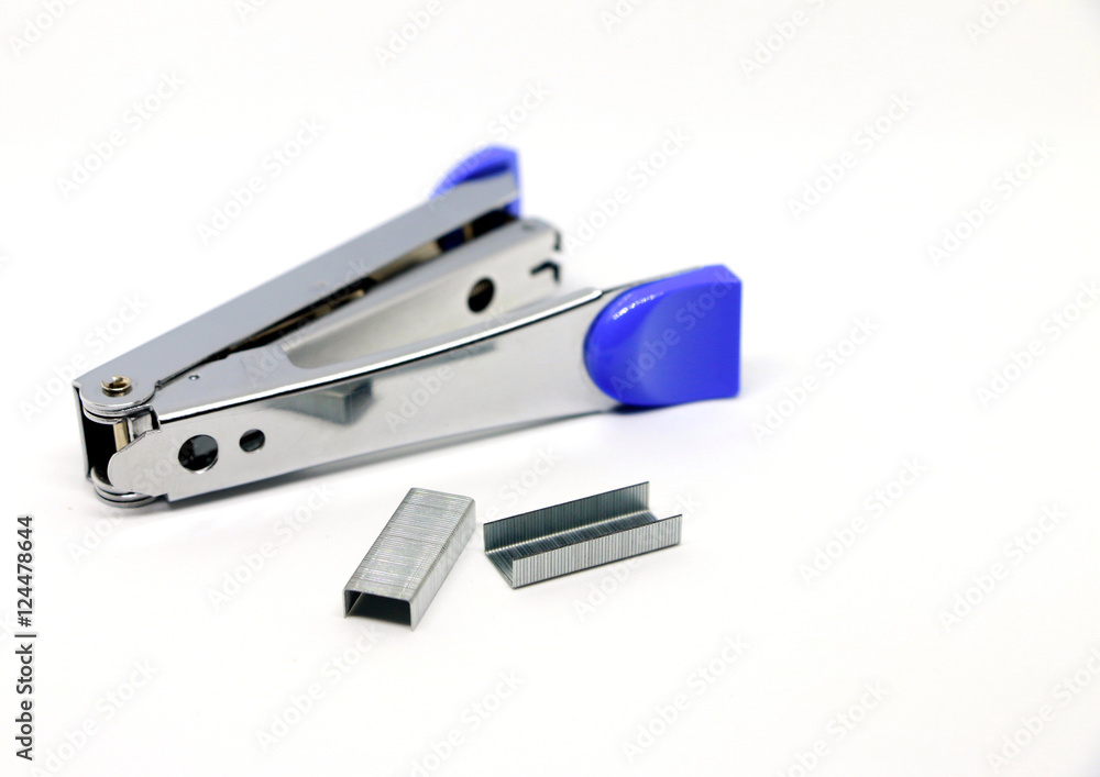 Stapler,Office tool. Stapler on the white background. Miscellaneous of office equipment. Paper clip,Stapler Stapler,Office tool. Stapler on the white background. Miscellaneous of office equipment. Paper clip,Stapler