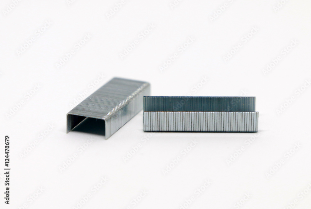 steples on the white background, Office tool. Stapler on the white background steples on the white background, Office tool. Stapler on the white background