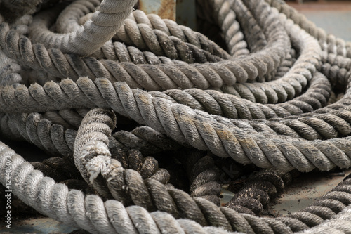 tackle ropes. heavy duty rope, Close-up Cluster of Rope Strands, coiled marine or nautical rope.