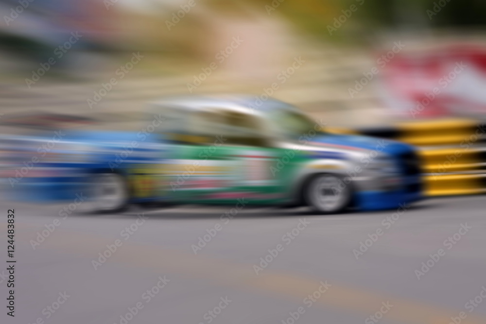 Race car racing on speed track with motion blur