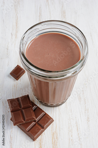 Chocolate milk with pieces of chocolate bar