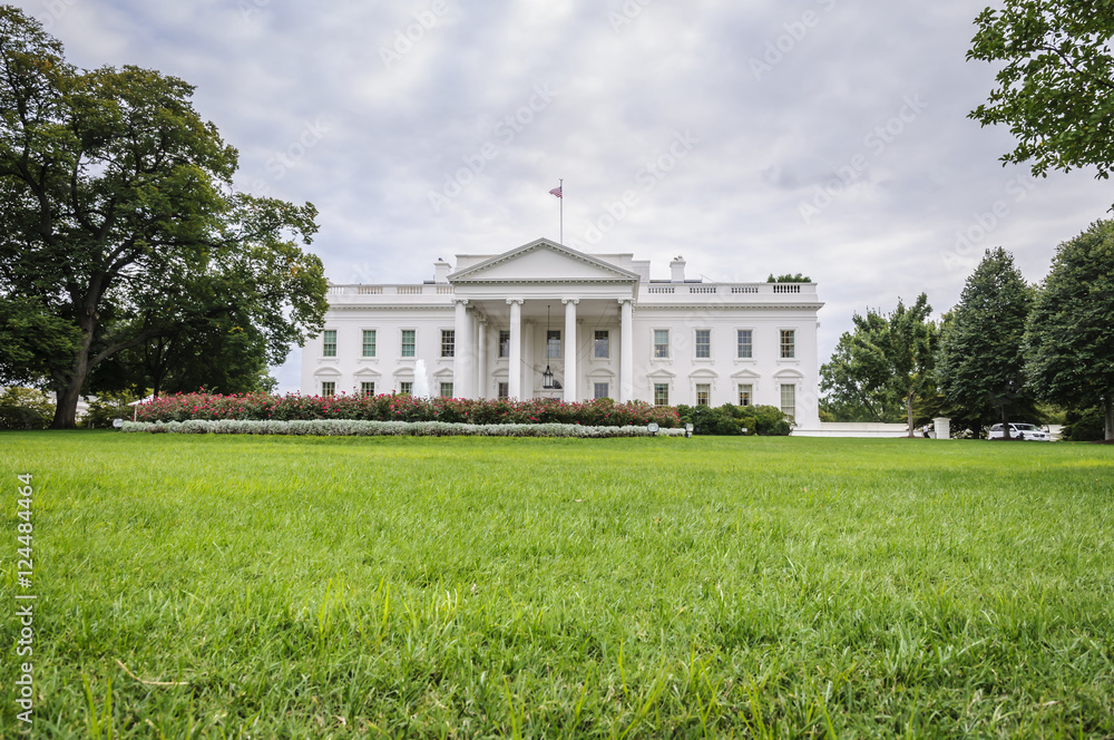 The White House in Washington D.C. at a cloudy day, green lawn in foreground, Executive Office of the President of the United States, USA