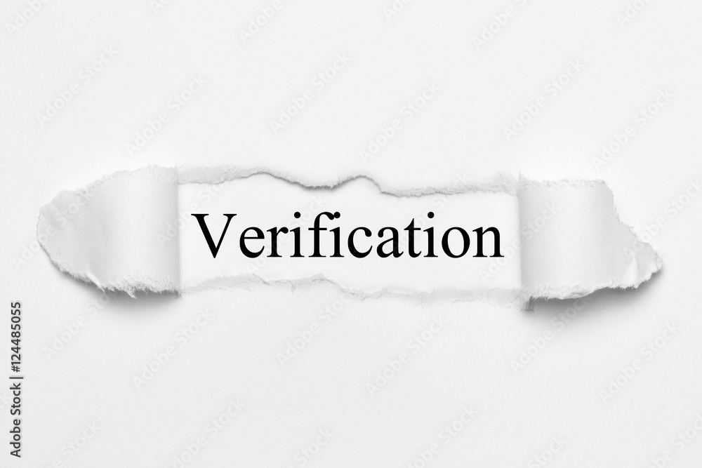 Fototapeta premium Verification on white torn paper