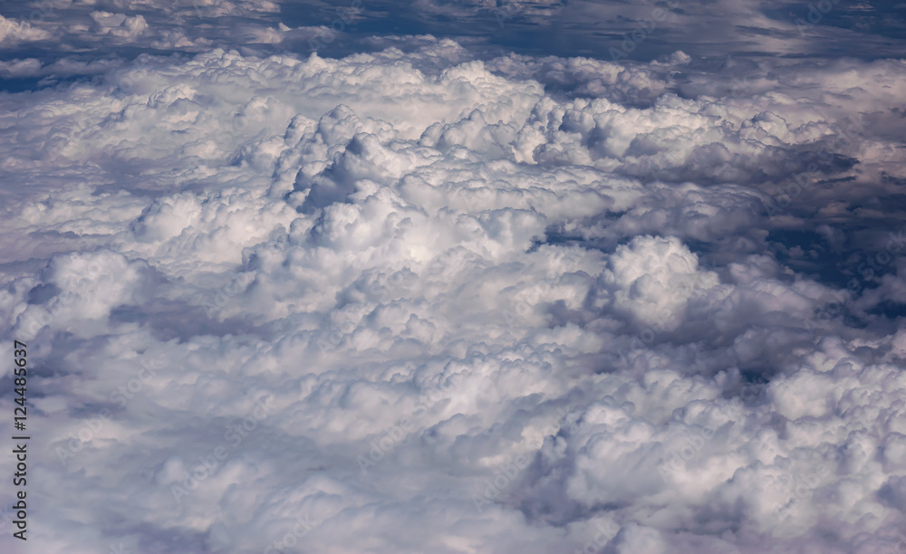 View from airplane at clouds. View from airplane at clouds.