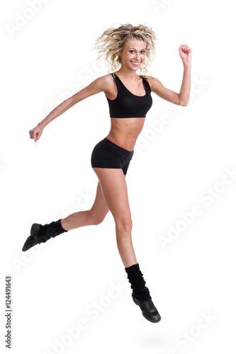 Aerobics fitness woman jumping isolated in full body.