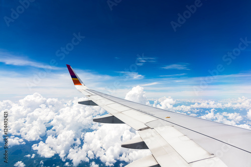 Wallpaper Mural Wing airplane above clouds Torontodigital.ca