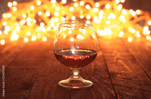 photo cognac glass in front of bokeh background