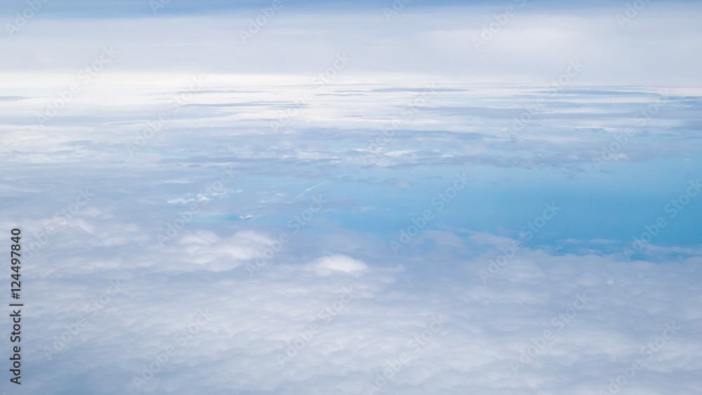 The beautiful cloudy and blue sky (view from airplane).