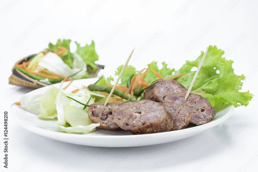 Sour pork and vegetable snacks in Thailand on white background Sour pork and vegetable snacks in Thailand on white background