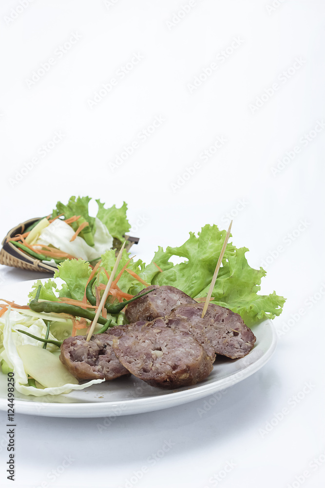 Sour pork and vegetable snacks in Thailand on white background Sour pork and vegetable snacks in Thailand on white background