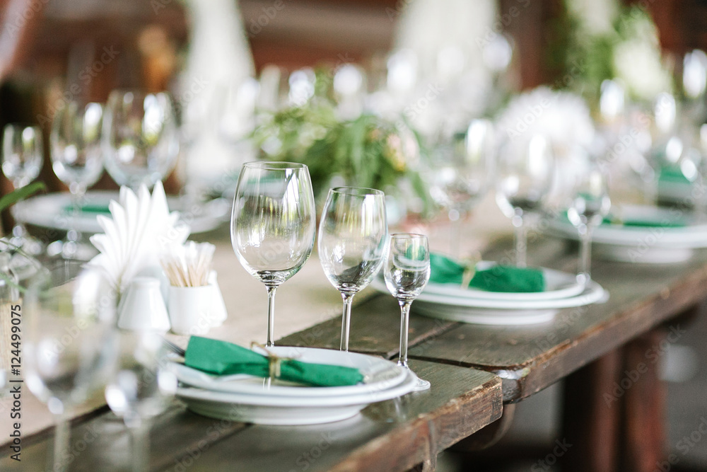 Festive table setting. Wedding decor. Table setting in classic s Festive table setting. Wedding decor. Table setting in classic s