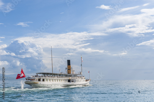 Old steamboat sailing on the lake Leman (Switzerland) photo