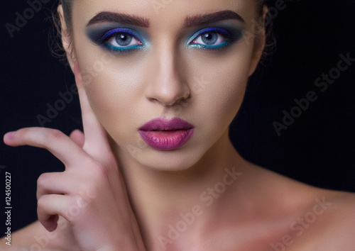 The girl with a beautiful evening make-up