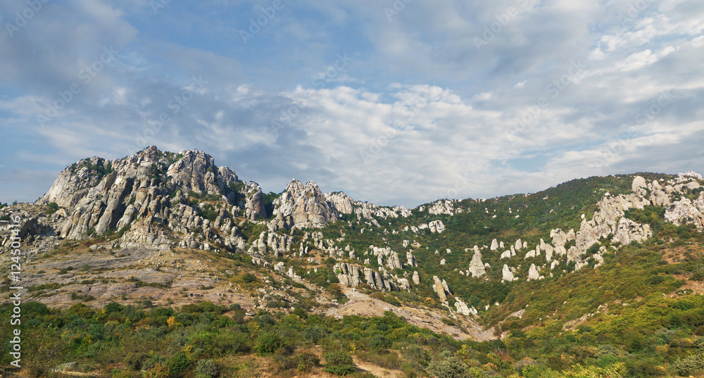 Panorama of the mountain South Demerdzhi on a background of clouds. Crimea.