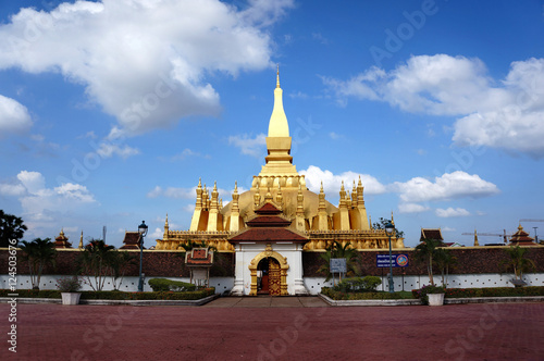 Pha That Luang in bright sky day. Vientiane, Laos