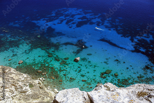 Breathtakig view from above on transparent sea water. photo