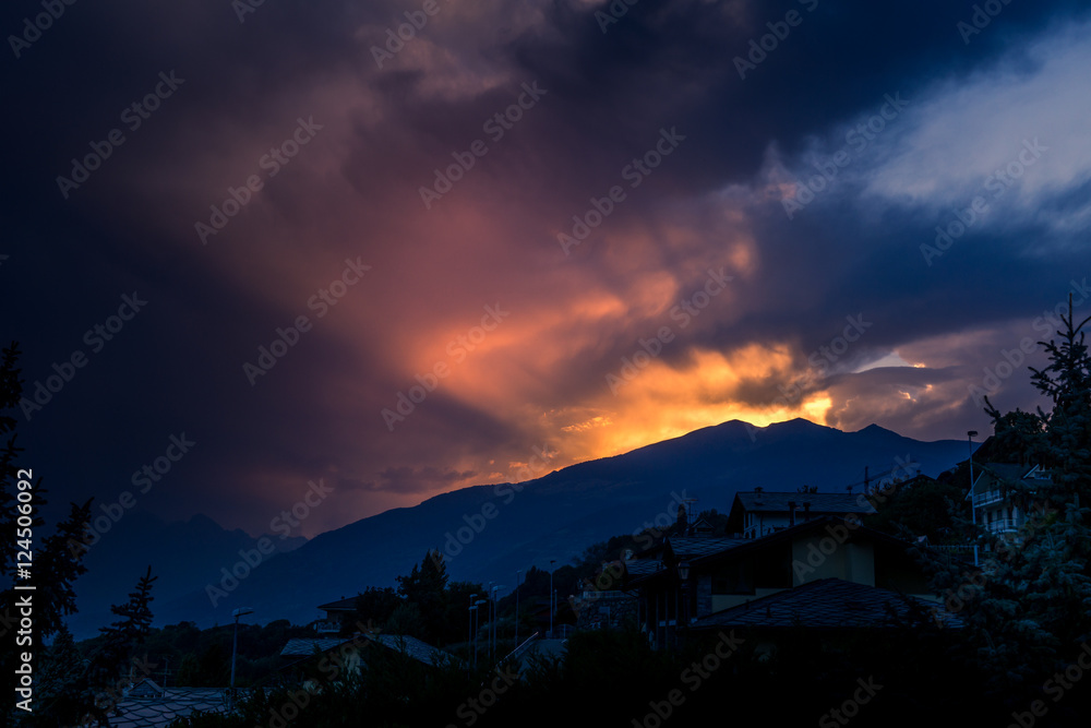 Obraz premium mountain landscape at sunset with colorful sky