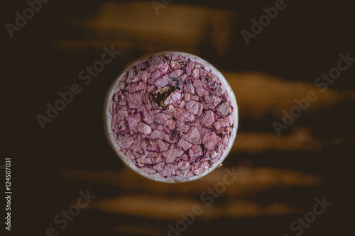 Wine cork, dark background, ambient composition photo