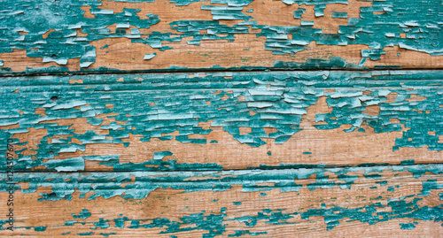 old cracked paint pattern on wood background.in turquoise and blue shade.