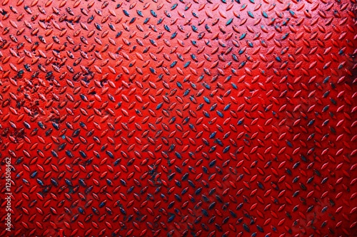  Red steel diamond plate with rusty texture
