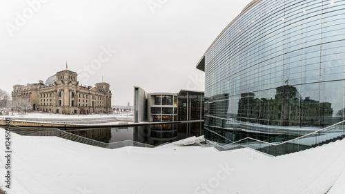Berlin, Germany Panoramic view of the Reichstag in the Paul Löbe house in winter. The Reichstag is reflected in the windows