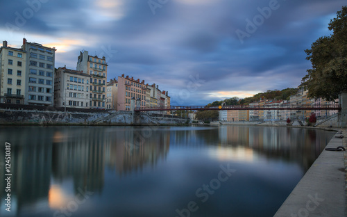 Cloudcover above the Saone river and .Passerelle Saint-Vincent in Lyon during sunset.
