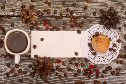 Cup of coffee, cookies, beans on wooden background. Template