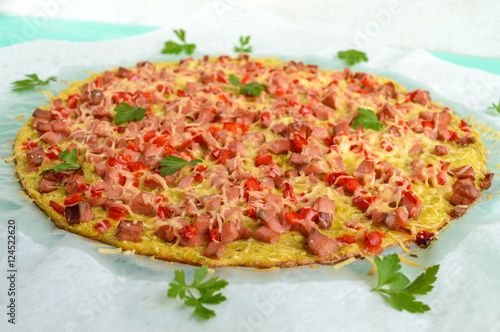 Pizza - the basis of zucchini, ham and paprika. Healthy food. The top view