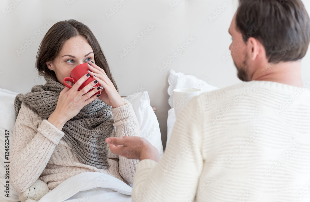 Attractive ill woman drinking tea Attractive ill woman drinking tea