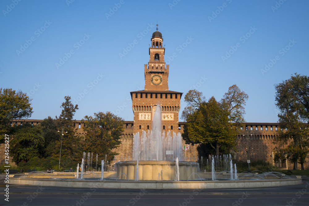 Milan, Italy. Sforzesco castle and Piazza Castello fountain. 