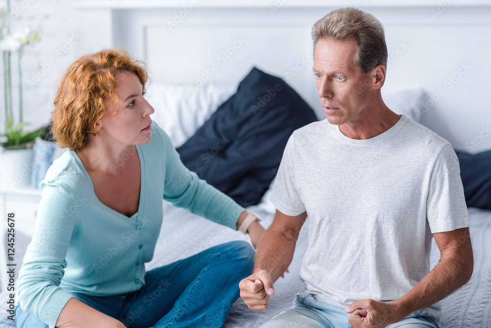 Inflamed aged couple quarreling Inflamed aged couple quarreling
