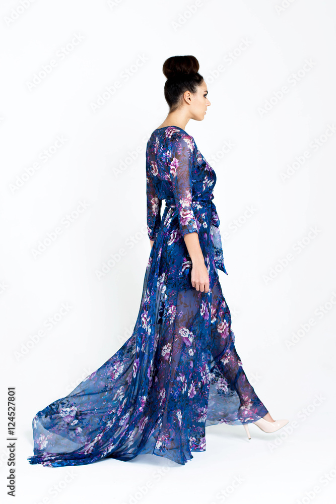 Beautiful woman in Dress. Fashion. Isolated over white.