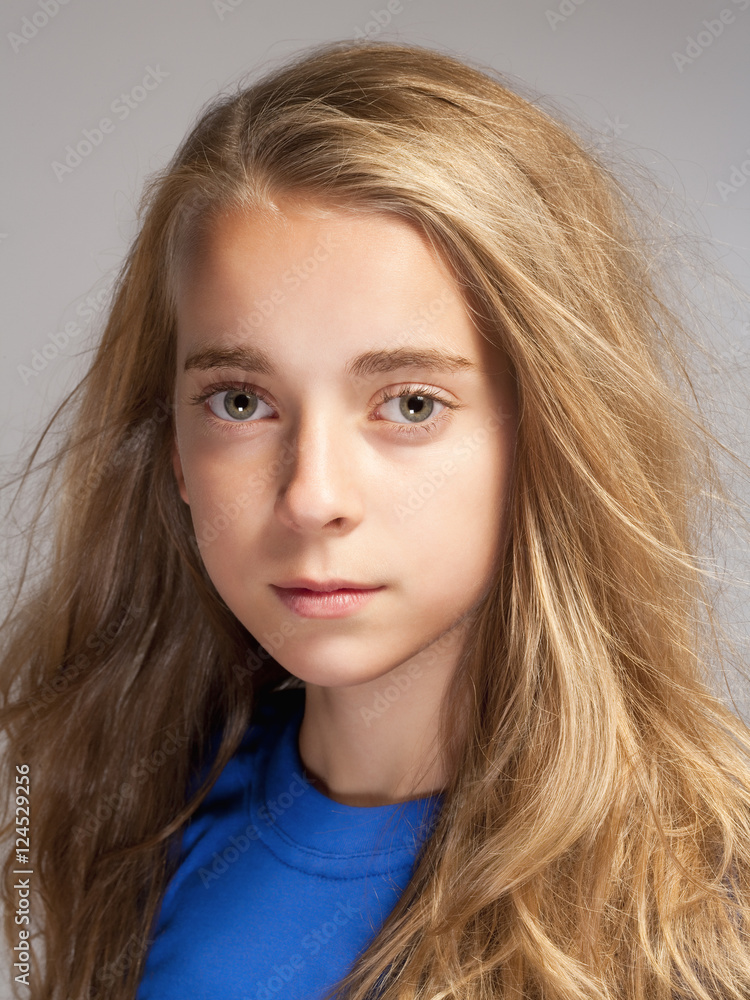 Portrait of a Beautiful Young Girl with Long Blond Hair Portrait of a Beautiful Young Girl with Long Blond Hair
