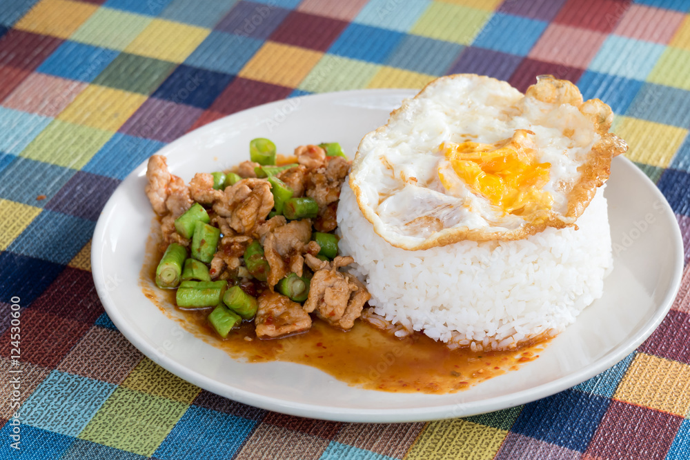Rice with Fried pork curry lentils and Fried egg 